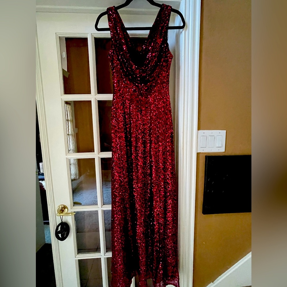 Like new- women’s size 10 Cachet formal gown in crimson.